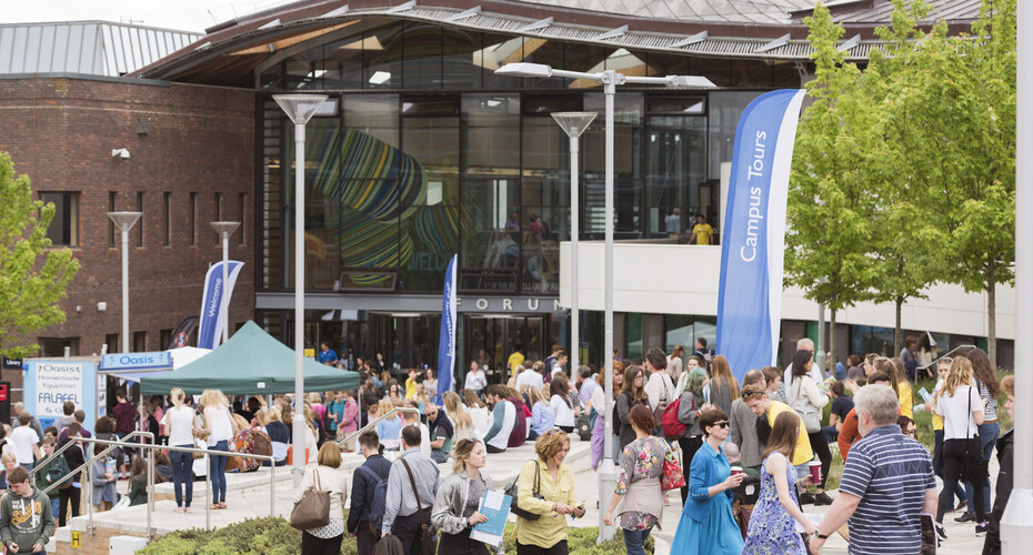 People walking outside the Forum at an Open Day