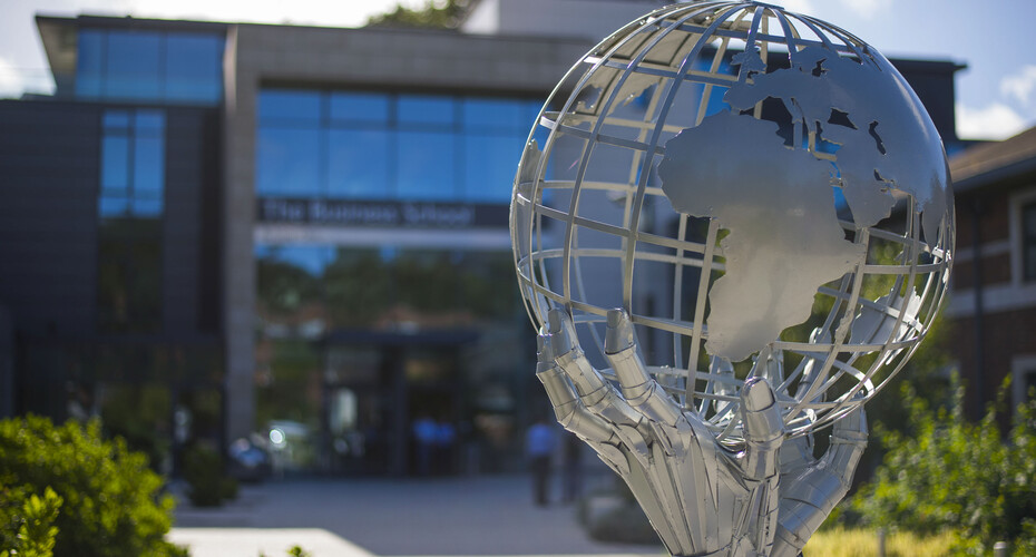 The 'In our hands' sculpture by Simon Ruscoe outside the Business School