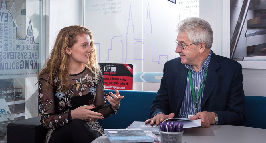 Lecturer and student in a discussion