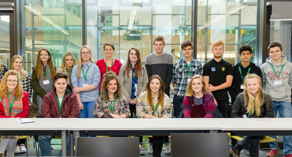 A group of school pupils with the outreach team at the business school